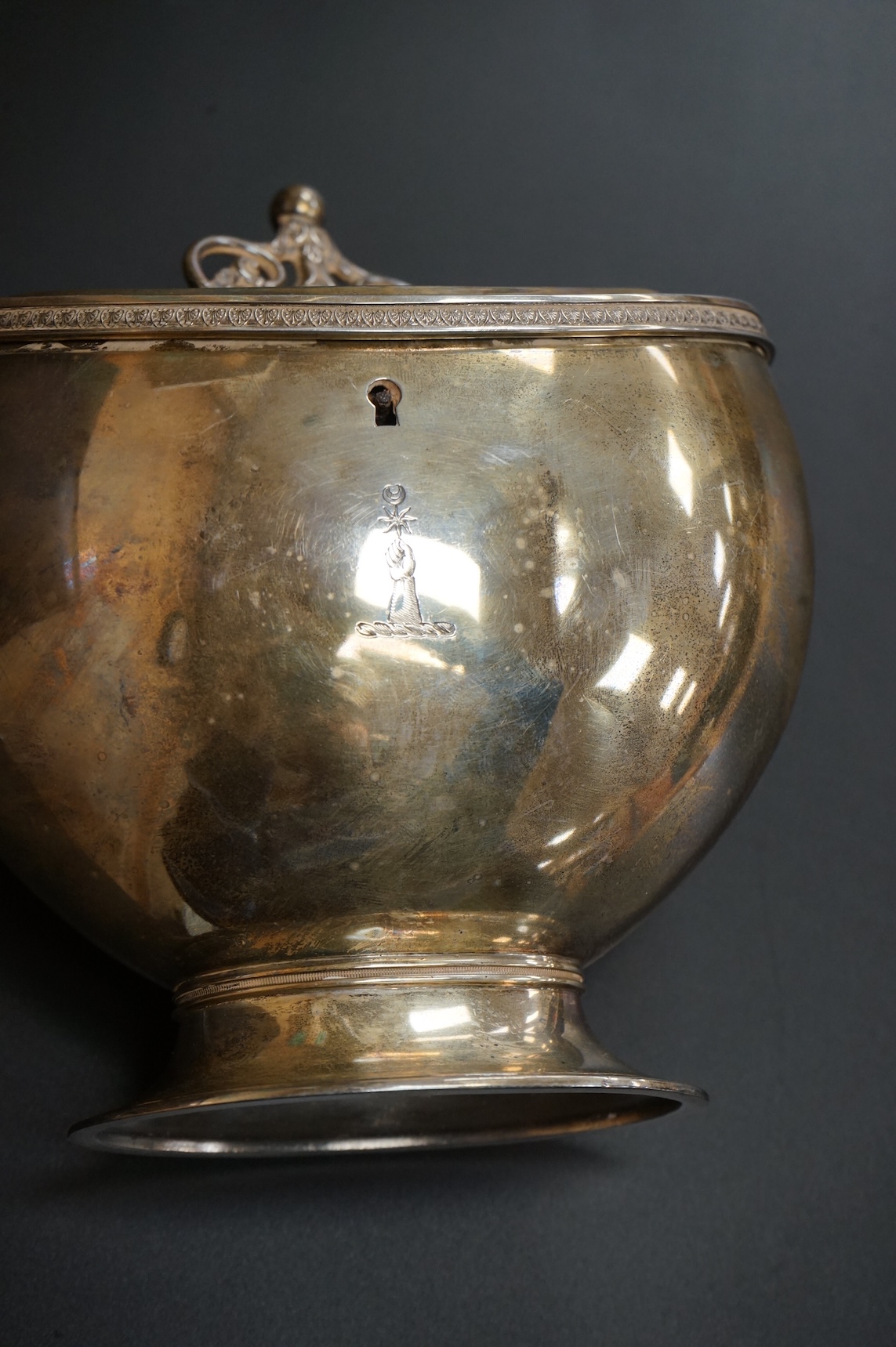 A late Victorian demi-fluted oval tea caddy, by William Hutton & Sons, London, 1894, width 11.1cm, together with a 19th century continental white metal oval tea caddy, possibly French, no key.